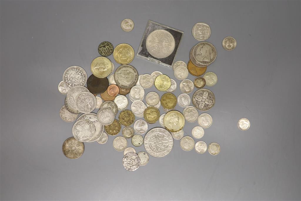 A group of coins in a leather box